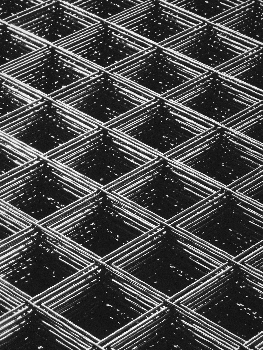 Stacked sheets of reinforcing mesh