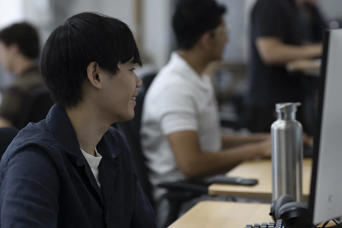 An engineer at their desk on the ProDex floor