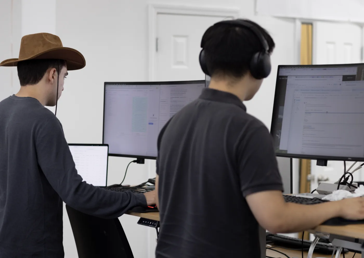 Two engineers at their desks in the ProDex office
