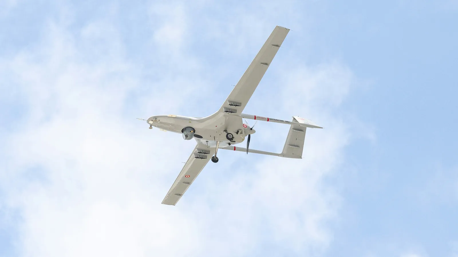 A fixed-wing uncrewed aircraft in flight